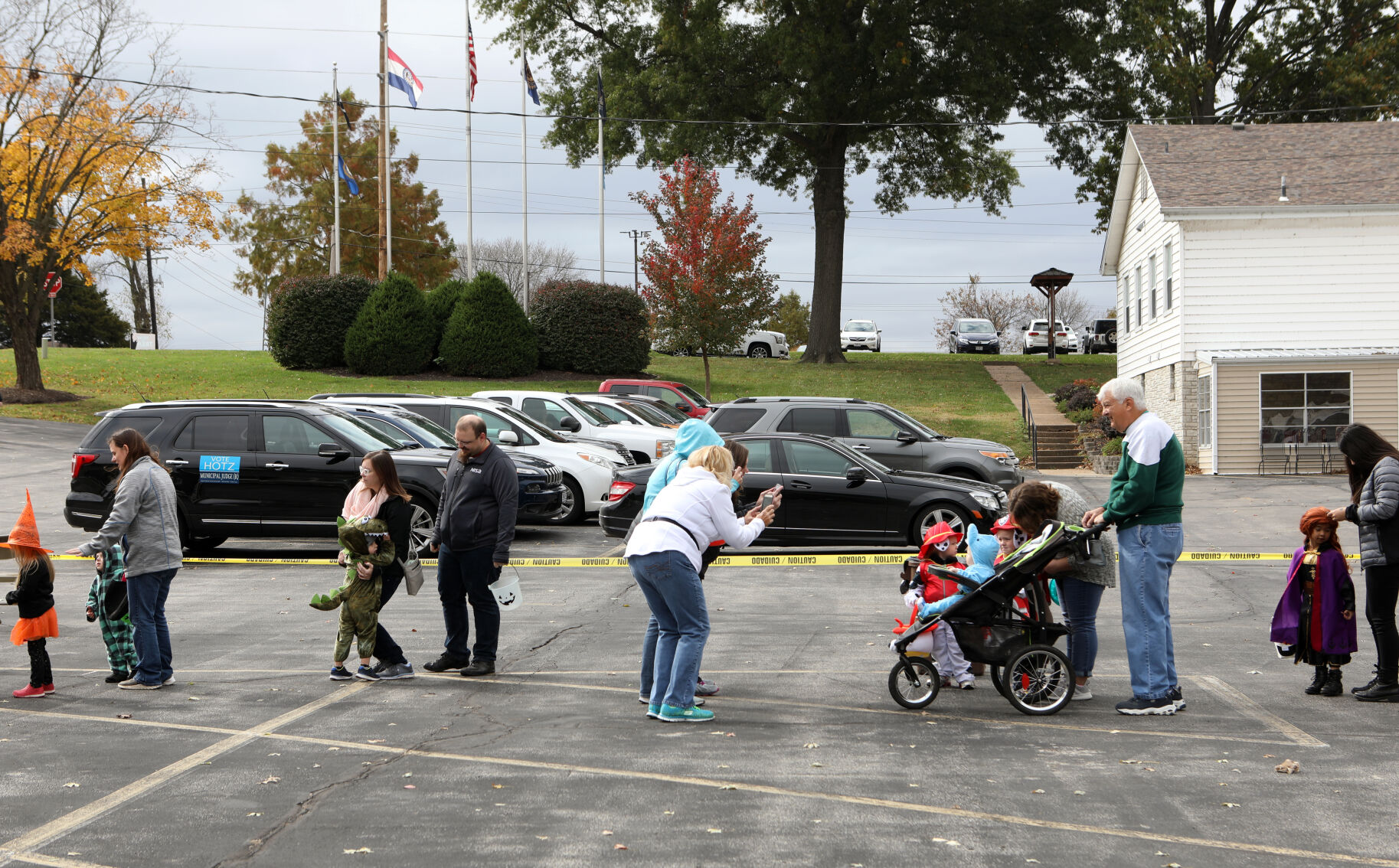 Children and their guardians line up at American Legion Post 218